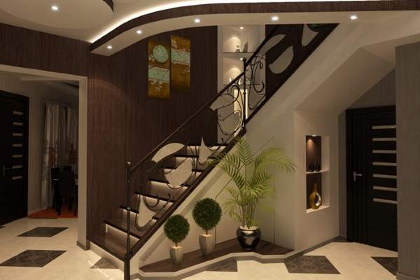 Дизайн прихожей с лестницей в частном доме в темных тонах